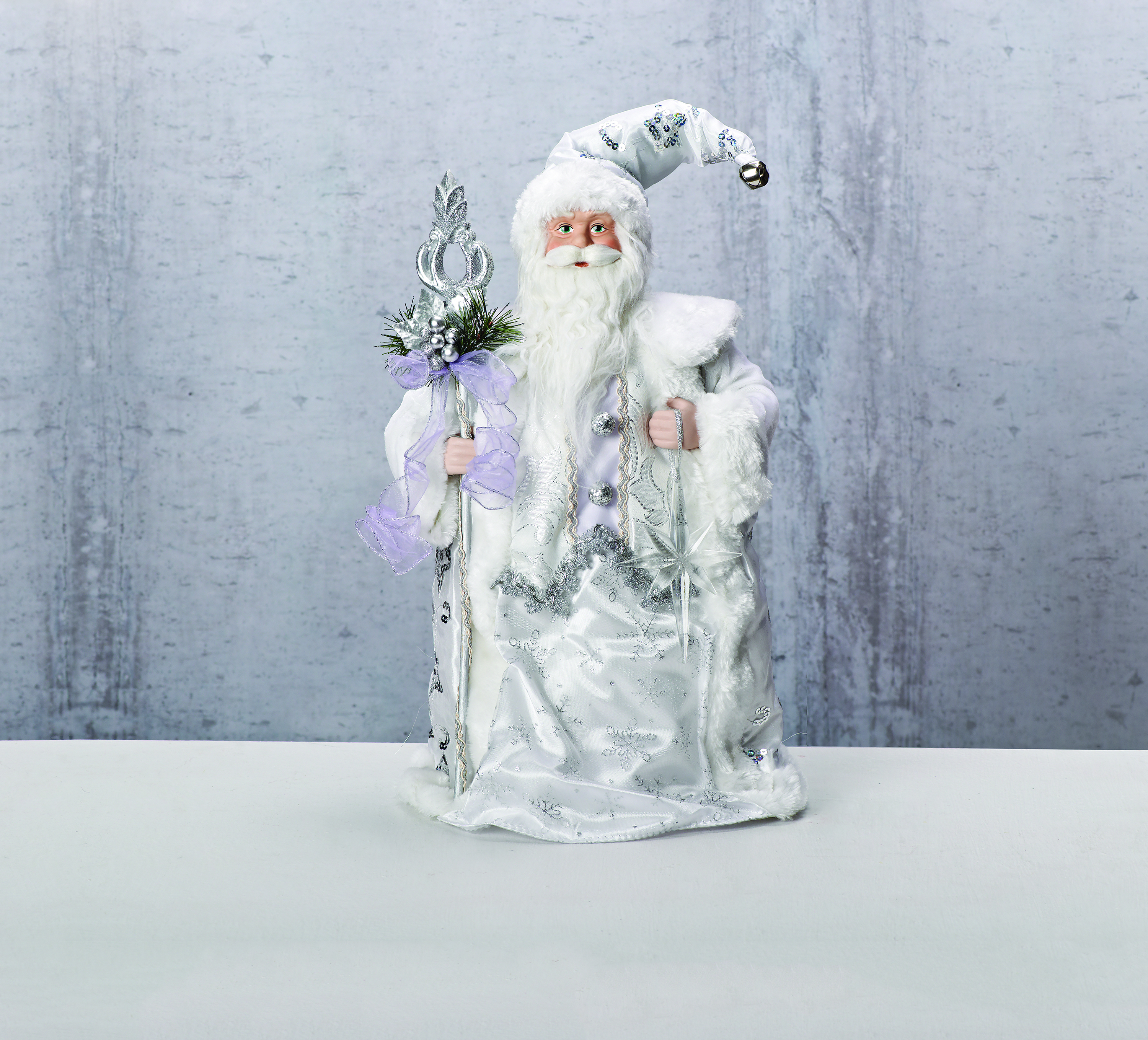 santa claus in white coat with white staff tree topper irish christmas tree topper